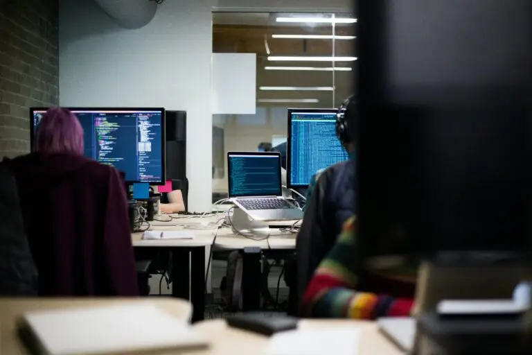 Guy working on computer